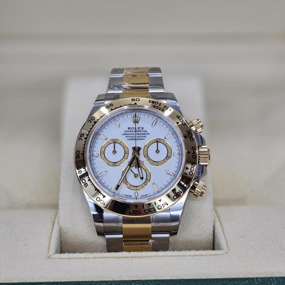 Rolex Daytona, Oystersteel & Yellow Gold, White with golden counter rings