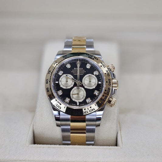 Rolex Daytona, Oystersteel and Yellow Gold, Black Diamond dial